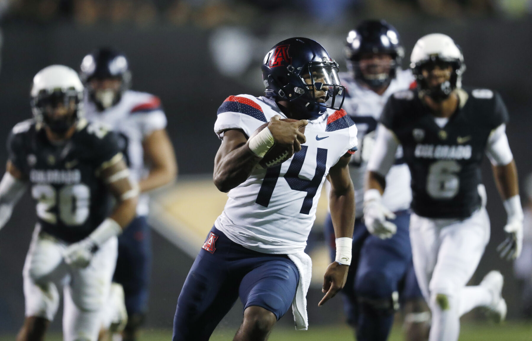 2017: Arizona's Khalil Tate rushes for 327 yards, an FBS record for a quarterback